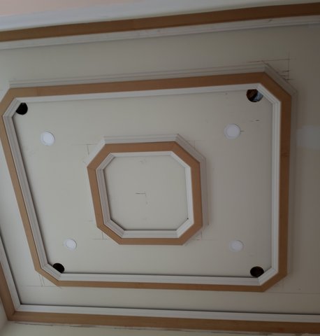 Coffered ceiling with raw wood octagonal medallion detail — Morris County NJ