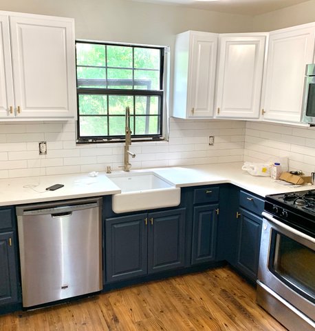 Kitchen cabinets after refinishing — finished result