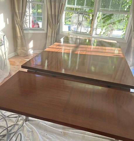 Dining table finished — high-gloss lacquer mirror result
