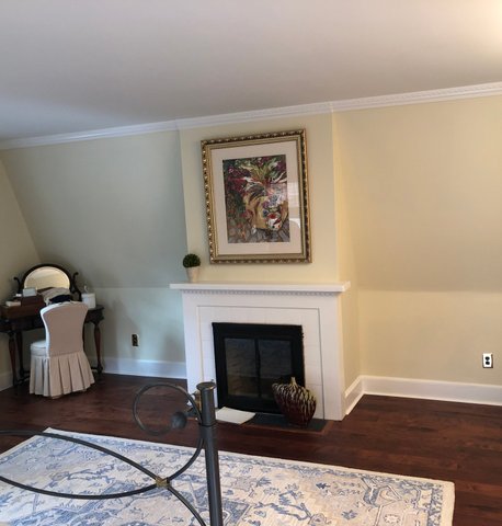 Hardwood flooring finished — master bedroom dark hardwood complete