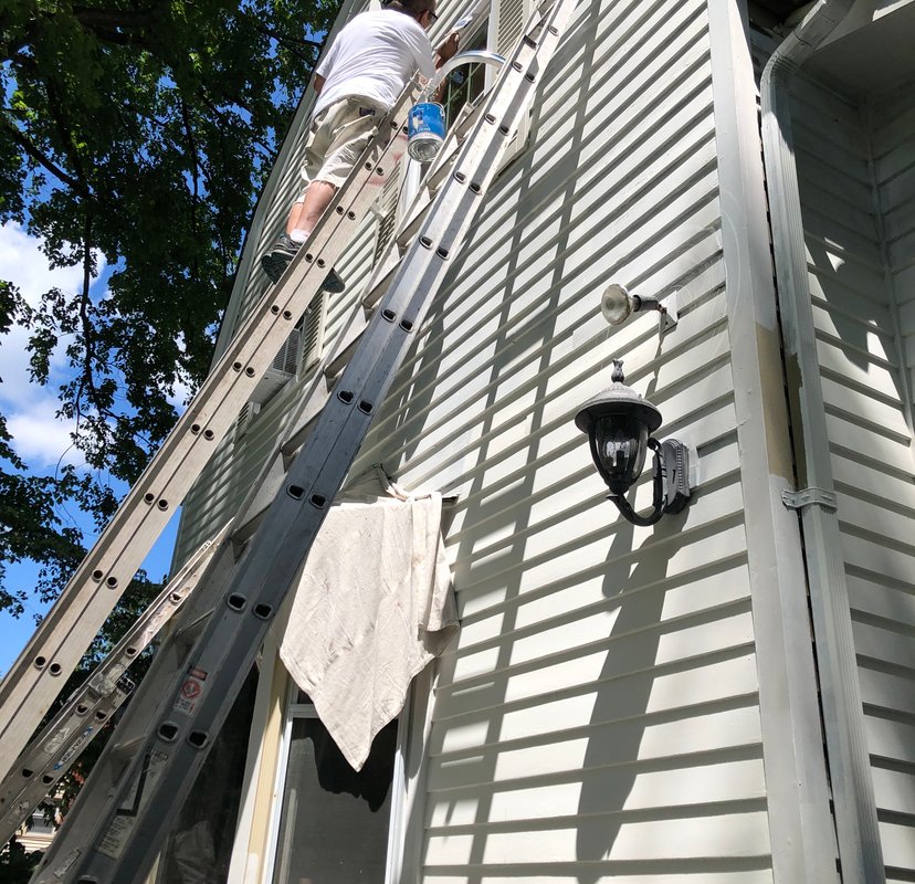 Romero Painting exterior ladder work